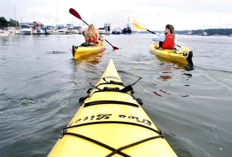 Kayakers embark on a paddle off Freeport.