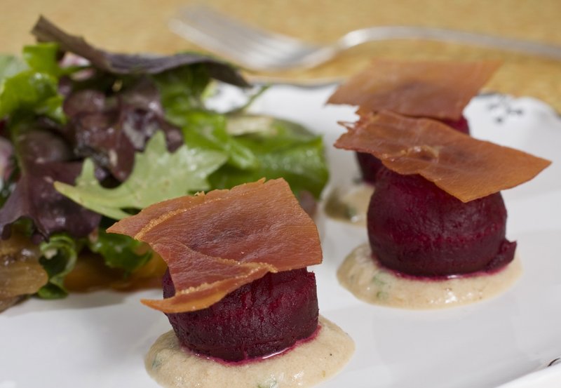 The crisped prosciutto in this spring salad with beets provides great crunchy feel and salty taste, and with far less fat than bacon.
