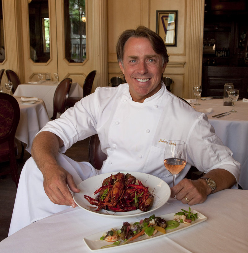 New Orleans chef John Besh displays his French crawfish boil, which includes Spanish tarragon and Tennessee truffles, in the kitchen of his restaurant, August.