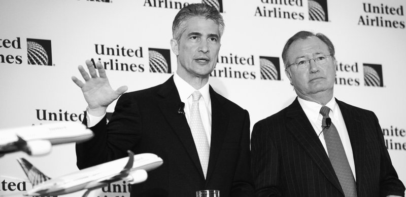 Continental Airlines CEO Jeffery Smisek, left, and United Airlines CEO Glenn Tilton discuss the $3 billion-plus deal that would create the world’s largest carrier with a commanding position in several top U.S. cities.