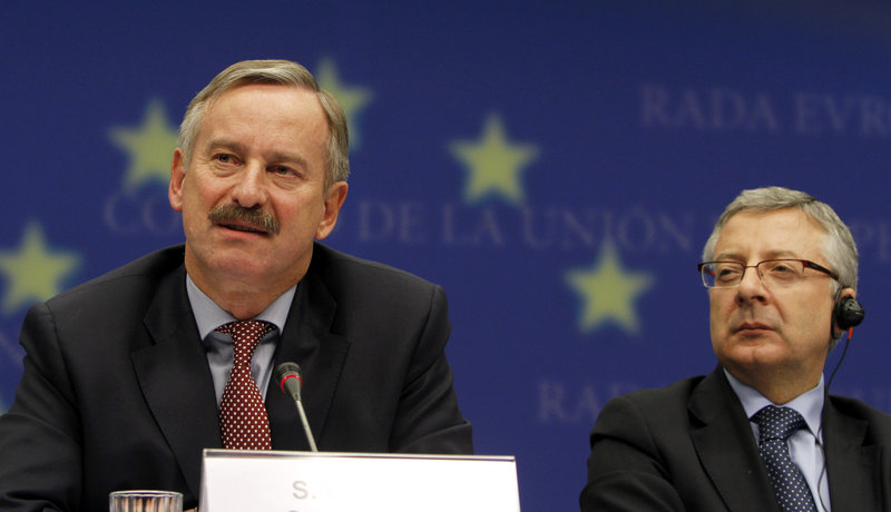 European Transport Commissioner Siim Kallas, left, speaks at a news conference Tuesday after an emergency meeting of EU transport ministers in Brussels, Belgium. At right is Spanish Minister for Transport Jose Blanco Lopez.