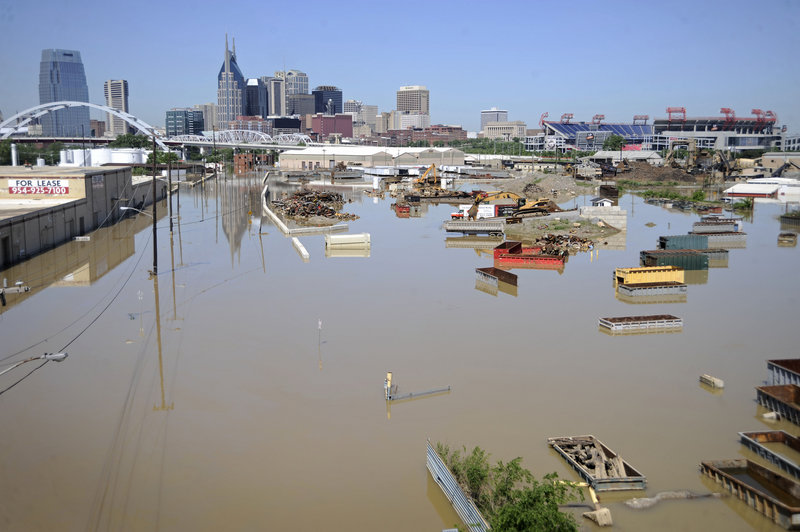 Freight containers are underwater Tuesday near Nashville, Tenn. Rescuers feared even more bodies would emerge as muddy floodwaters remain from torrential weekend rains that swamped much of Tennessee and two neighboring states, leaving at least 29 dead.