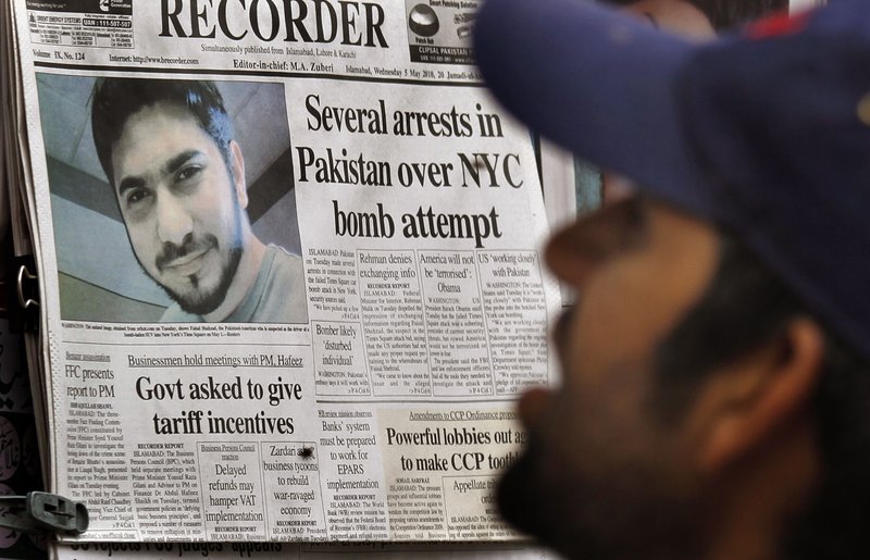 A Pakistani man in Islamabad reads a morning newspaper Wednesday, with the headline story about arrests in the Times Square bomb attempt. Pakistan army officials do not believe the Pakistani Taliban were behind the Times Square bomb attempt as the insurgent group has claimed.