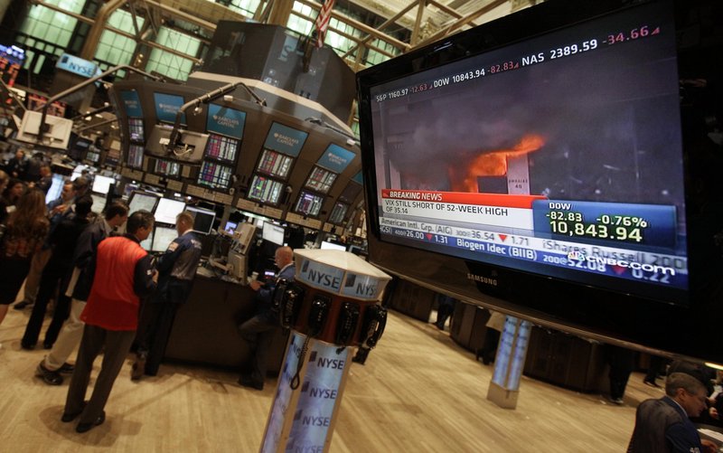 The Associated Press Two lines please A television screen on the floor of the New York Stock Exchange shows unrest in Greece, Wednesday, May 5, 2010.