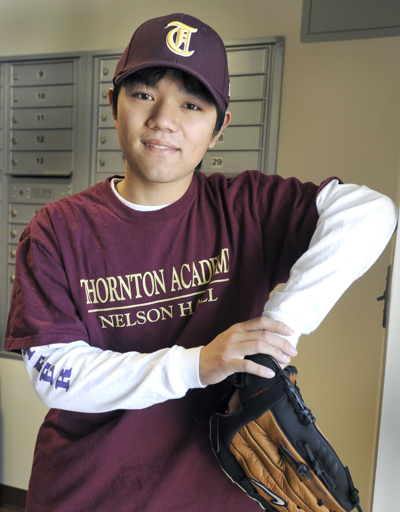Linfeng “Patrick” Zhu of China has taken up baseball at Thornton Academy because “I wanted to try something American-style. I love baseball.”