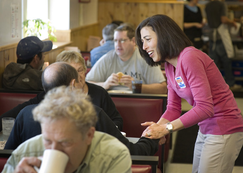 Candidate for governor Rosa Scarcelli visits with customers at Becky’s Diner in Portland last week as she tries to build her name recognition among voters.