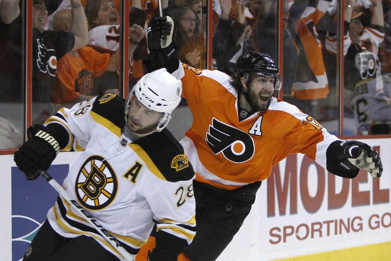 Simon Gagne of the Philadelphia Flyers celebrates Friday night after scoring the overtime goal that defeated the Boston Bruins 5-4 and kept the series alive.