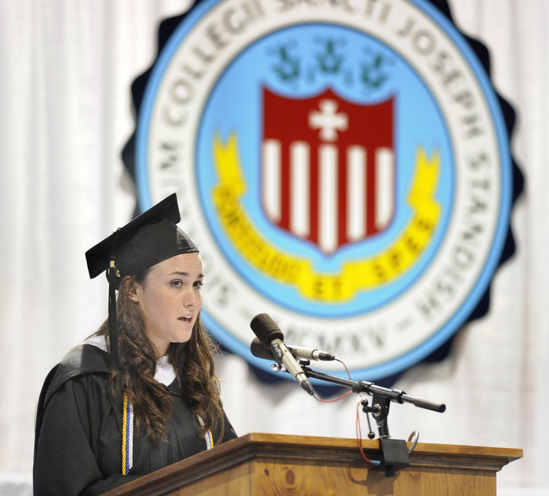 Valedictorian Allison Zellers of Concord, N.H., speaks during the Saint Joseph’s College graduation in Standish on Saturday.