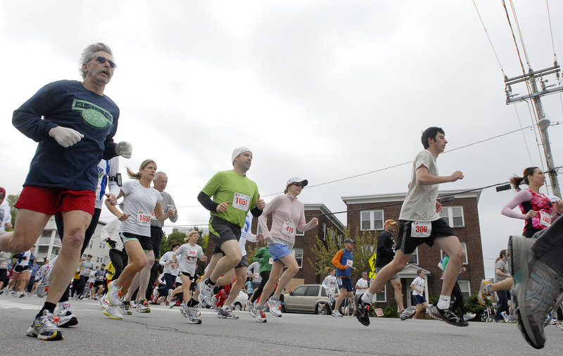 Runners head down Park Avenue near Hadlock Field at the start of the Sea Dogs Mother's Day 5K. More than 2,500 participants finished the 10th edition of the race.