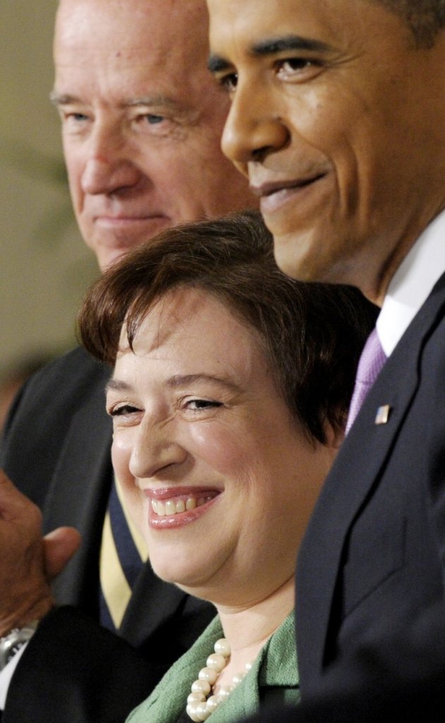 Elena Kagan is flanked by President Obama and Vice President Biden on Monday at the White House.