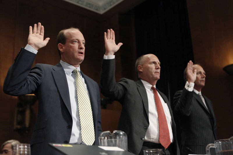 Being sworn in as they prepare to testify at a Senate hearing Tuesday are, from left, Lamar McKay, president and chairman of BP American; Steven Newman, president and CEO of Transocean Limited; and Tim Probert, chief health, safety and environmental officer for Halliburton.