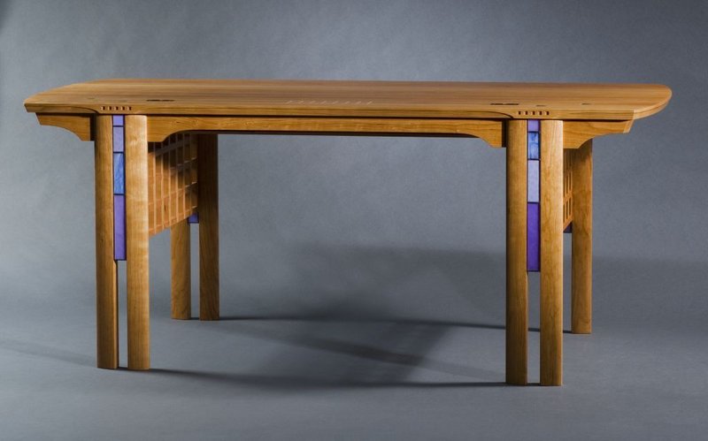 Furniture maker Kevin Rodel describes his style as International Arts and Crafts. The Brunswick craftsman's studio will be open by appointment to the public through early June. Pictured is Rodel's Glasgow Desk in cherry.