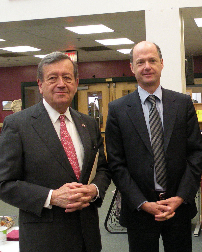 Severin Beliveau, left, Maine's honorary French consular, escorts Christophe Guilhou, France's new consul general.