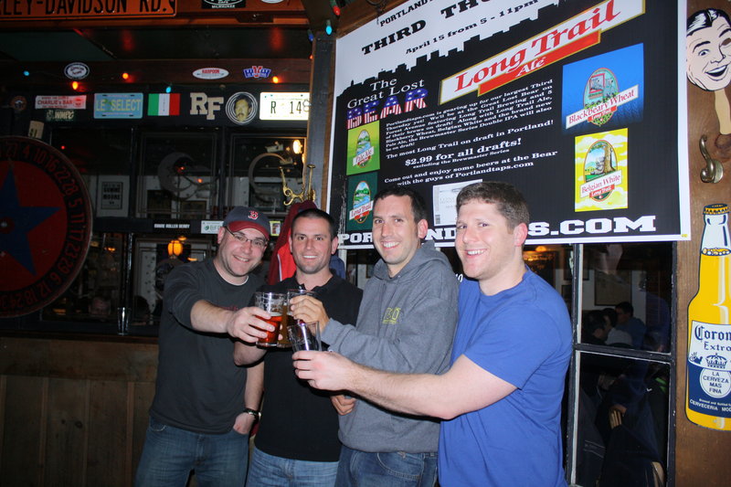 The PortlandTaps.com founders raise brew glasses with the traveling Long Trail representative recently. From left are Cory Cronk, Long Trail's Steve Kierstead, Josh Baston and Caleb O'Connell.