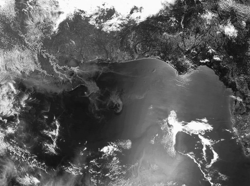 A satellite image provided by NOAA shows a clearly defined oil slick in the Gulf of Mexico on Monday. The blown-out well from the explosion of the Deepwater Horizon oil rig has by most estimates pumped out at least 4 million gallons of crude so far.