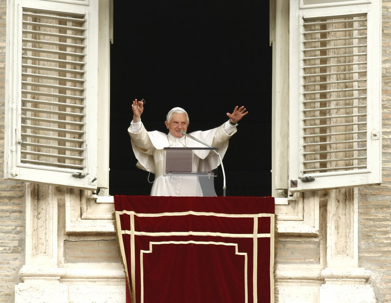 Pope Benedict XVI offers a blessing from the window of his studio overlooking St. Peter’s Square, at the Vatican on Sunday. An estimated 150,000 people filled St. Peter’s Square in a show of support for the pope over the clerical sex abuse scandal, the Vatican said. Benedict said he was comforted by a “beautiful and spontaneous show of faith and solidarity.”