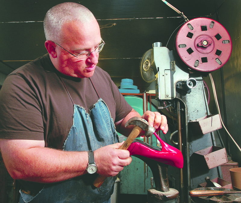 Services such as shoe repair would be taxed under the new law, which opponents decry but supporters say is necessary.