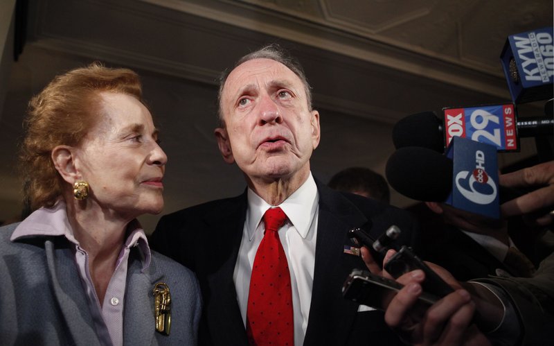 Five-term Sen. Arlen Specter, D-Pa., stands with his wife, Joan, before they voted Tuesday in Philadelphia. Specter lost the primary to Rep. Joe Sestak, whose calling card was a TV ad emphasizing Specter’s change in party affiliation.