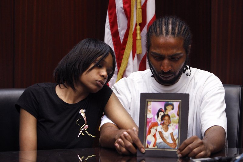 Dominika Stanley, the mother of Aiyana Jones, 7, who was killed Sunday in Detroit, sits with Aiyana’s father Charles Jones in attorney Geoffrey Fieger’s office in Southfield, Mich.