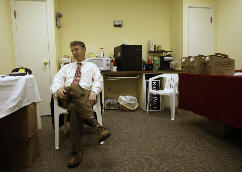 Republican U.S. Senate candidate Rand Paul sits in a makeshift kitchen at his campaign headquarters Wednesday during an interview after winning his party’s primary election in Bowling Green, Ky. Paul issued a statement Thursday on the Civil Rights Act of 1964.