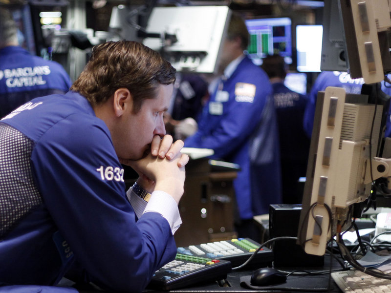 Traders working on the floor at the New York Stock Exchange Thursday had a rare good day, as the market reversed a slide that had seen losses in eight of 10 days.