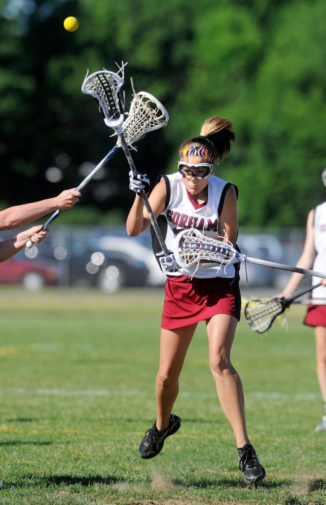 Chelsea Black of Gorham fires a shot on goal Thursday during a 10-9 victory against York in a schoolgirl lacrosse game at Gorham. The Rams improved to 9-2. York is 6-5.