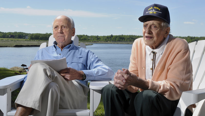 B.J. Palanza, left, and his brother John sit by the Nonesuch River in Scarborough on Friday and talk about their brothers, Tony and Sam. Tony Palanza died in a kamikaze attack in April 1945. His older brother Sam, who died three months ago, asked that his ashes be scattered at the site.