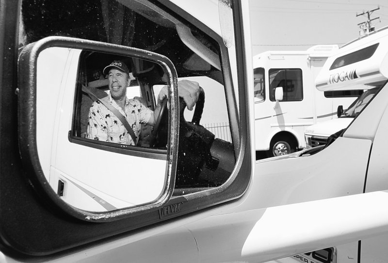 Sid Moreno, of Moorpark, Calif., drives away form a dealer’s lot in a 29-foot motorhome as he heads out for the Memorial Day weekend.