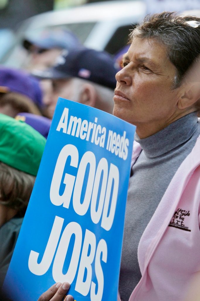 Ann Converso, of Buffalo, N,Y., joins a protest calling attention to unemployment during a rally in New York in late April. Currently, Congress is working on a bill to extend jobless benefits.