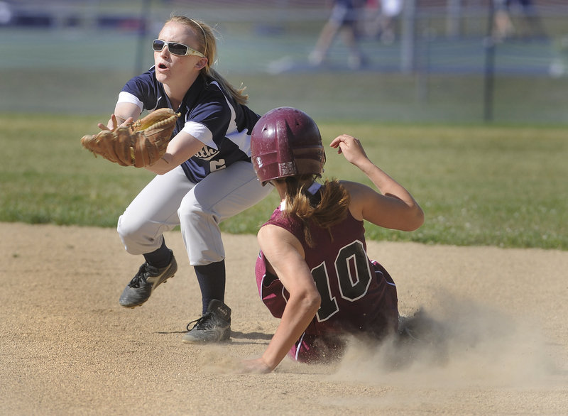 Yarmouth shortstop Rachel Mosher awaits the throw as Greely's Michelle Kahn slides safely into second base with a steal in the second inning.