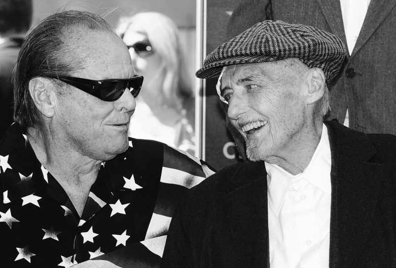 Actor Jack Nicholson, left, congratulates Dennis Hopper after Hopper was honored with a star on the Hollywood Walk of Fame in Los Angeles in March. Hopper died Saturday at his Venice, Calif., home, surrounded by family and friends.
