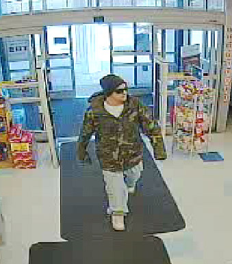 Photos from the surveillance video of the male suspect in the robbery of the Naples Rite Aid Pharmacy on Monday.