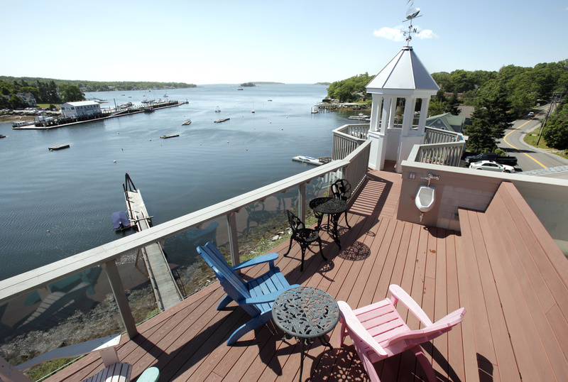 The views from the top deck of the Oest home, overlooking Boothbay Harbor, are nothing short of spectacular.