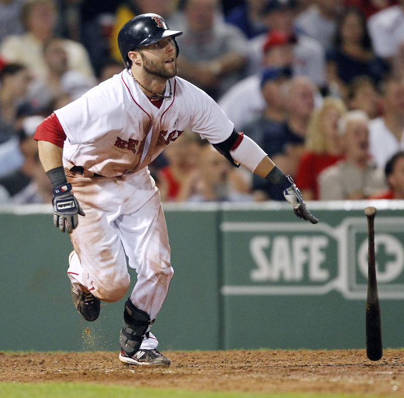 Boston's Dustin Pedroia watches his triple in the eighth inning in a game against the Dodgers Sunday in Boston. The Red Sox won 2-0.
