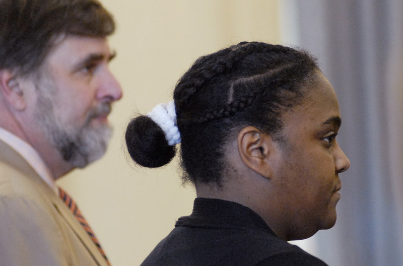 Darlene George listens as the jury returns a guilty of murder verdict against her at York County Superior Court today.