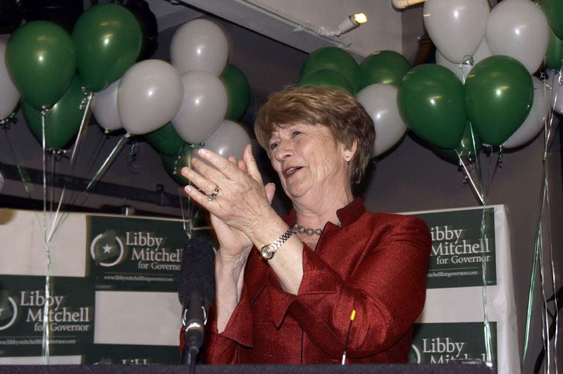 Libby Mitchell, Democratic gubernatorial nominee, greets supporters at her campaign headquarters in Portland Tuesday.