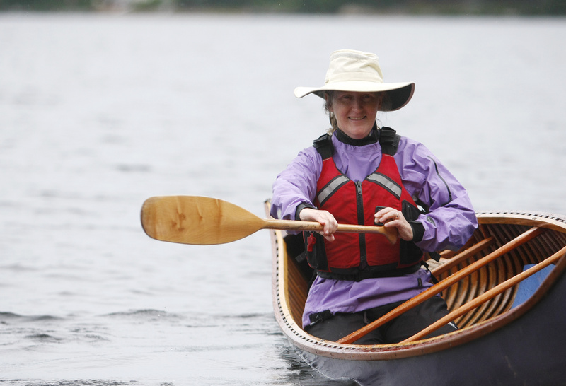 Becky Mason demonstrates proper stroke during an introduction to solo paddling class at the Maine Canoe Symposium last weekend at Winona Camps in Bridgton.