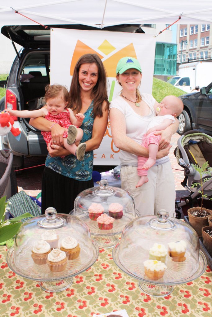 Stephanie O'Neil, right, organized the market. She runs Tulips Cupcakery & Farm and is shown here holding her daughter Autumn O'Neil and standing next to her friend Jenny Carrigan and her daughter Colby Davis.