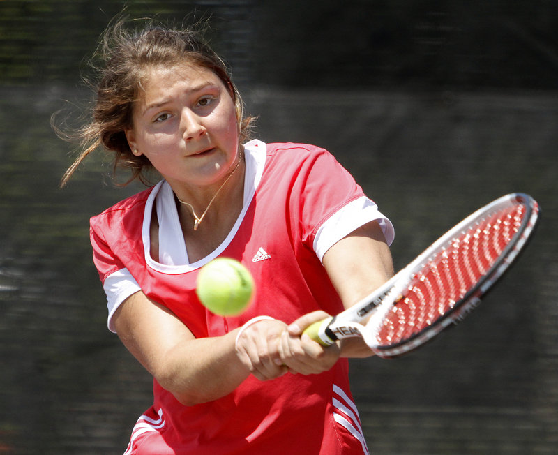 Elena Mandzhukova, an exchange student from Portugal who plays for Brunswick, returns a shot Monday during her 6-4, 7-6 (4) win over Falmouth’s Analise Kump in the girls’ singles state final.