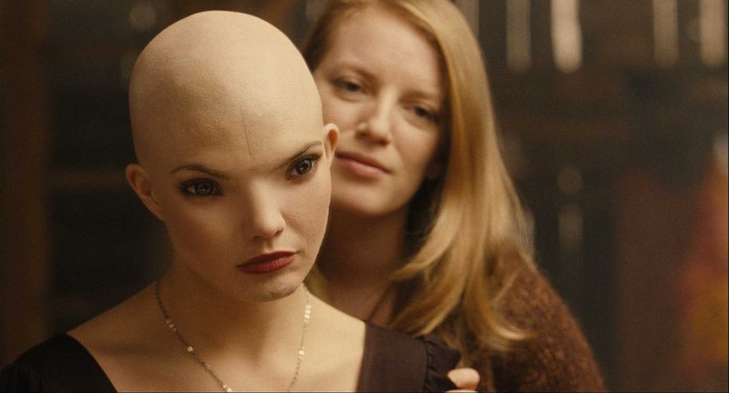 Warner Bros. Delphine Chaneac, left, as the newly created organism Dren and Sarah Polley as the scientist Elsa in the sci-fi thriler “Splice.”