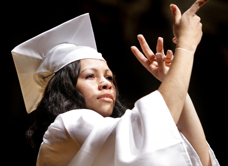Yuri Shepard-Kegl signs and leads "The Star-Spangled Banner" at her Portland High School graduation earlier this month.
