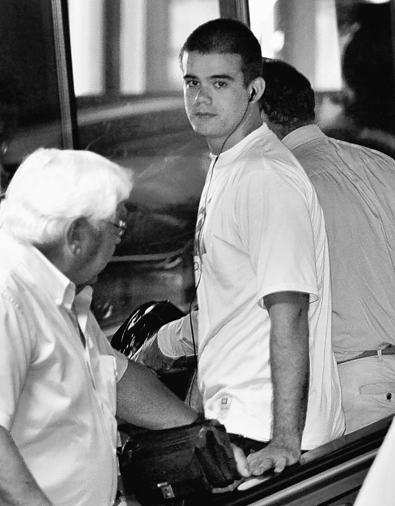 In this 2005 photo, Joran van der Sloot of Aruba, who had been held by police on the Caribbean island in connection with the disappearance of American tourist Natalee Holloway, exits Schiphol airport in Amsterdam, Netherlands. Peruvian police confirmed Wednesday they are seeking Van der Sloot in Sunday’s killing of Stephany Flores, 21, at a Lima hotel.