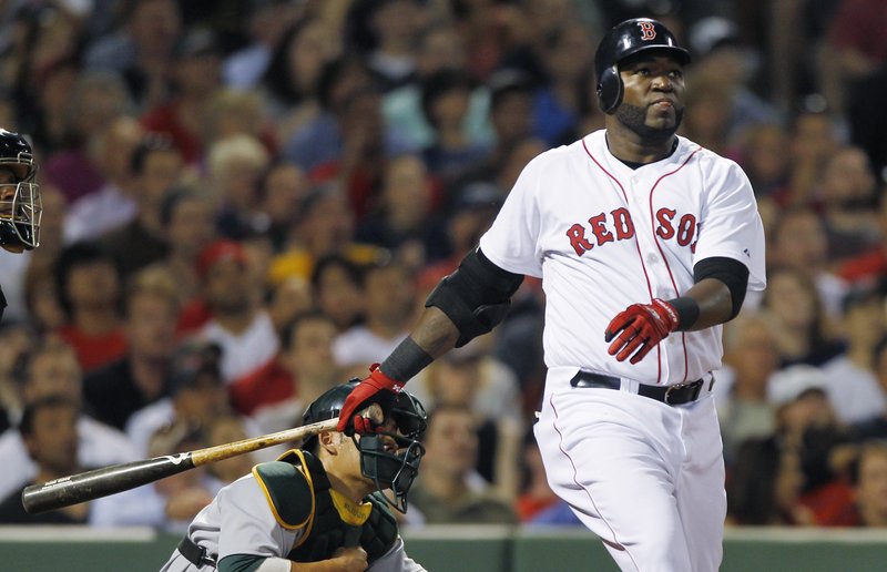 David Ortiz of the Boston Red Sox watches the flight of the ball down the right-field line Wednesday night. It went for a home run – the key hit in a 6-4 victory against Oakland.