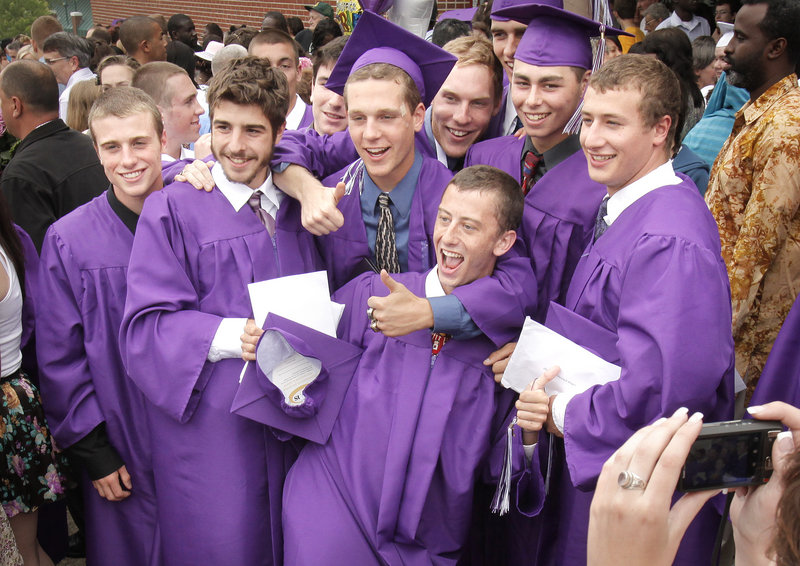 Deering High grads pose for a group photo to mark their time together.