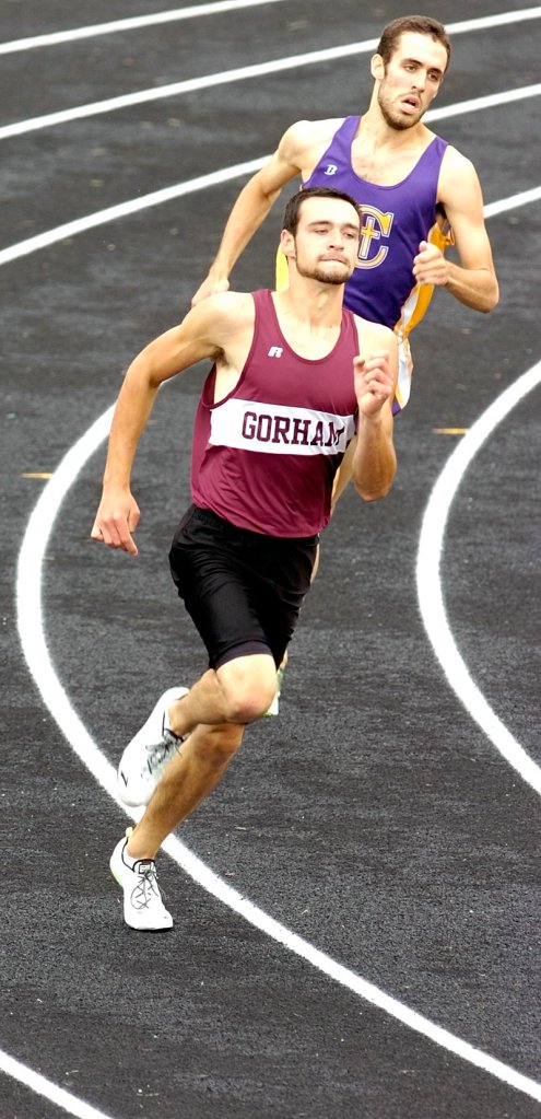 Cam Stevens of Gorham leads Tim Woods of Cheverus around the final turn Saturday and goes on to win the 400 in 50.34 seconds at the Class A state meet at Augusta.