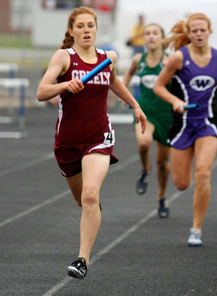 Sara Schad of Greely heads to the finish line Saturday while competing in her portion of the 3,200 relay at the Class B state championships in Windham. Greely won the event.