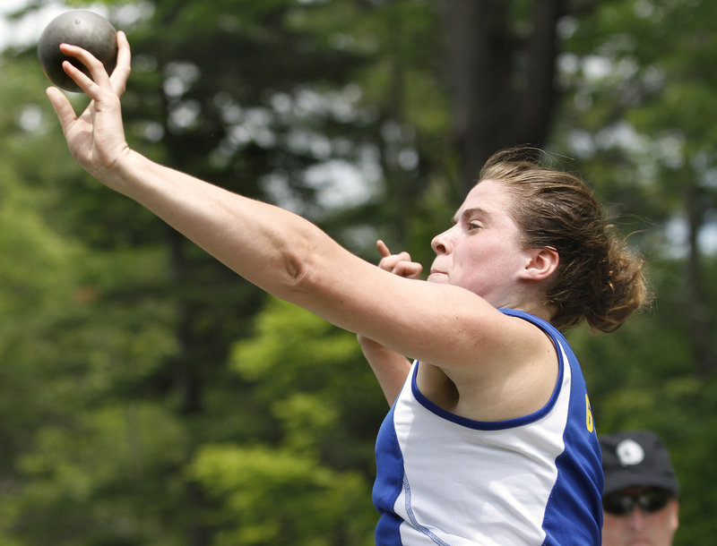 Katie Sparks of Falmouth releases her throw while finishing third in the shot put at 37 feet, 9 inches. Natasha Griffith of Waterville won with a throw of 38-6 3/4.