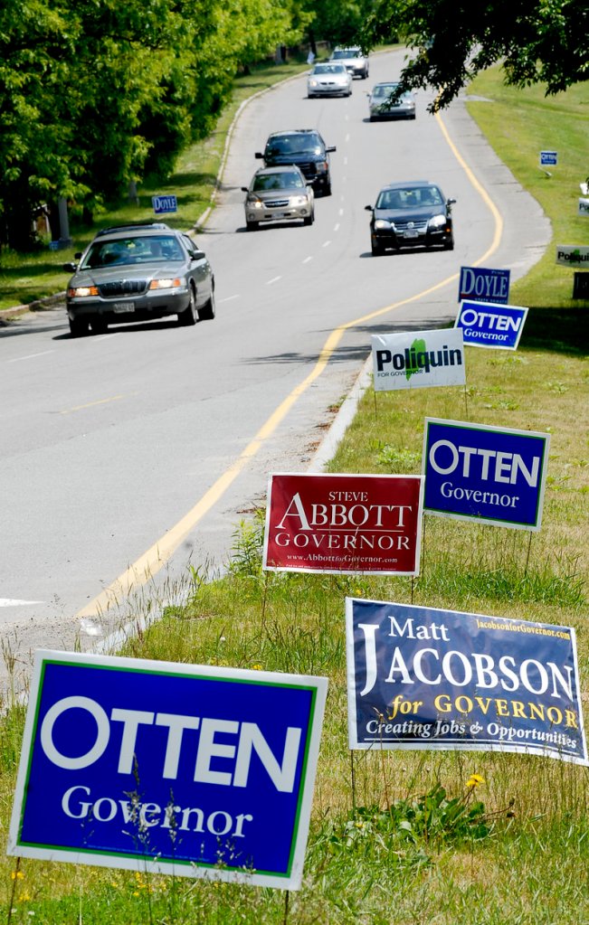 The plethora of campaign signs lining Franklin Arterial in Portland is evidence of the many candidates running for Maine governor. Such a large field is one reason that many voters are still undecided.