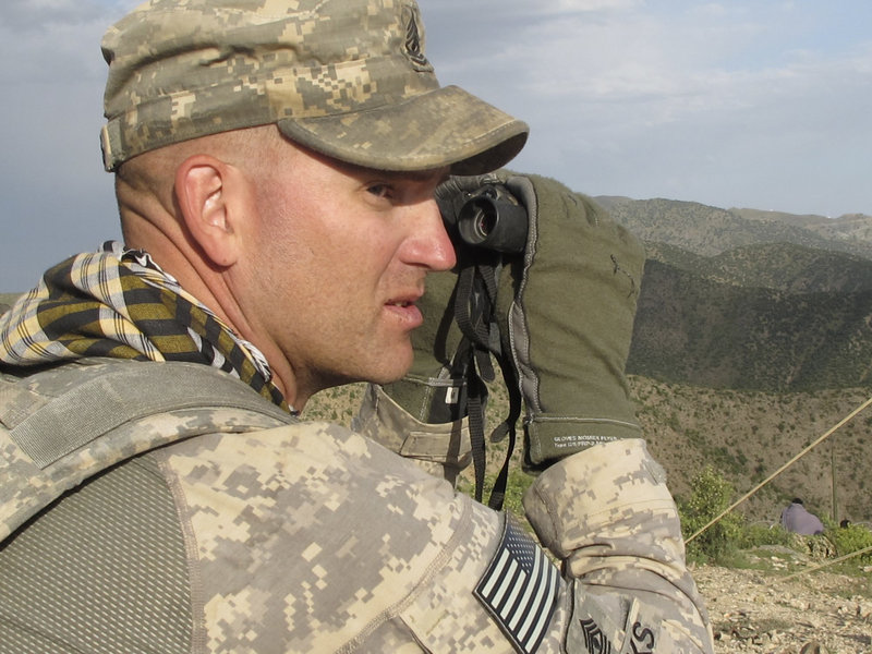 1st Sgt. John Brooks of Glenburn monitors activity in eastern Afghanistan's Pesho Ghar valley from an observation post manned by the Maine Army National Guard.