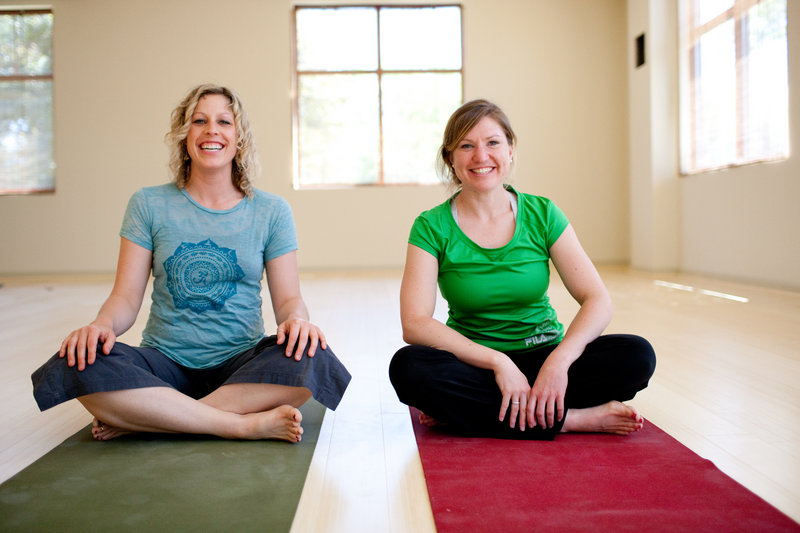 Heidi MacVane, left, and Danielle Morin are co-owners of Greener Postures Yoga, which recently opened at 740 Broadway in South Portland. The studio offers vinyasa flow yoga classes, defined as “breathing synchronized movement.”